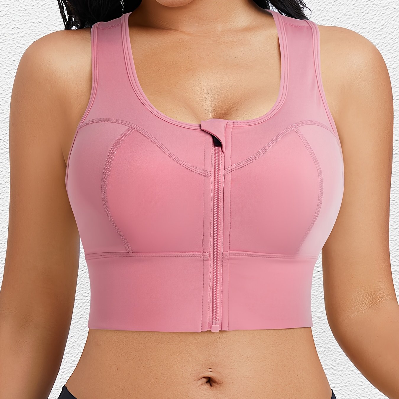 Anti-slip sports bra designed to stay in place during jumping, jogging, and sweating.