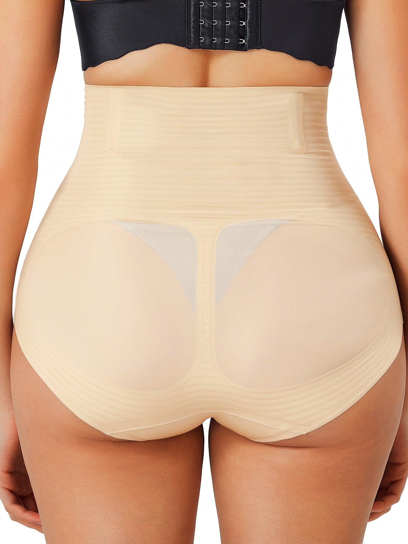 Body smoothing shapewear panty in black with seamless sides and anti-slip waistband.

