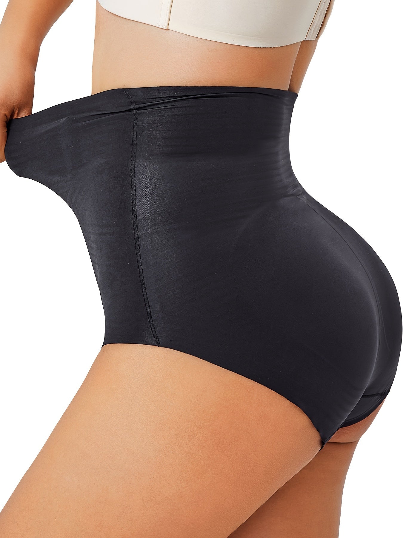 Seamless control panties in black designed for women who want a smooth fit under any outfit.

