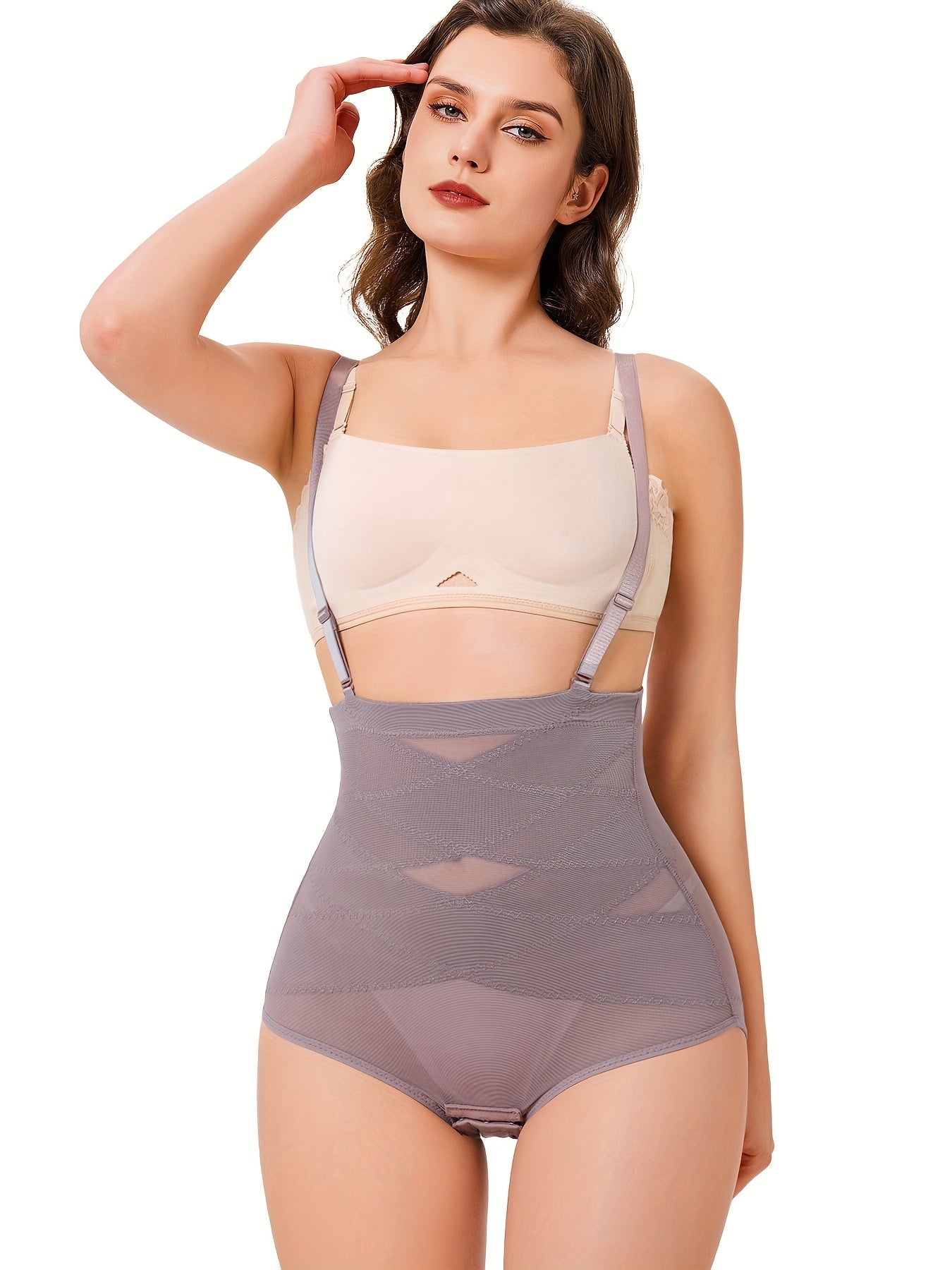 Waist control panty shapewear with breathable stretch fabric and hip lift zones.

