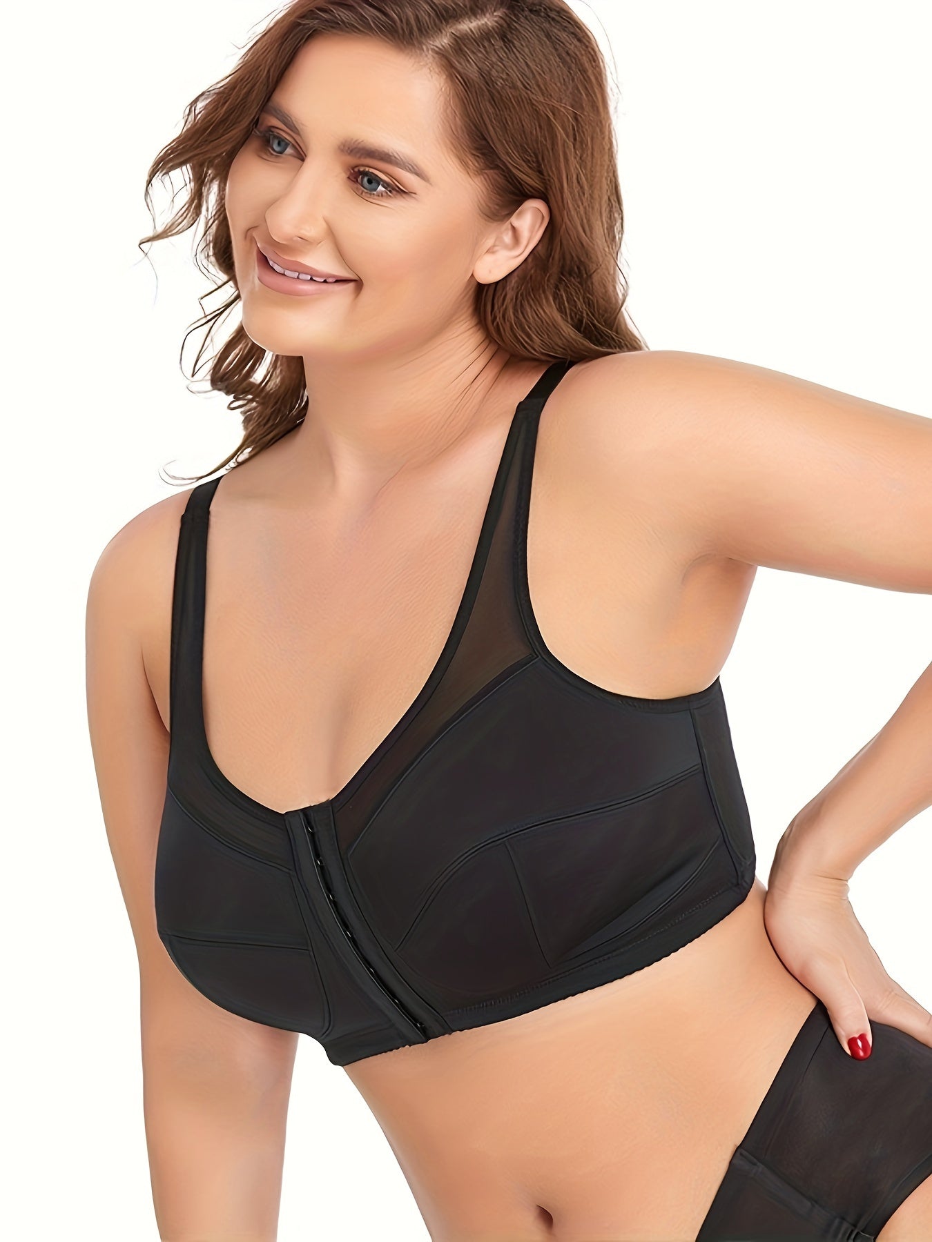 Front zip sports bra with padded support and sculpting fit for curvy plus size women.