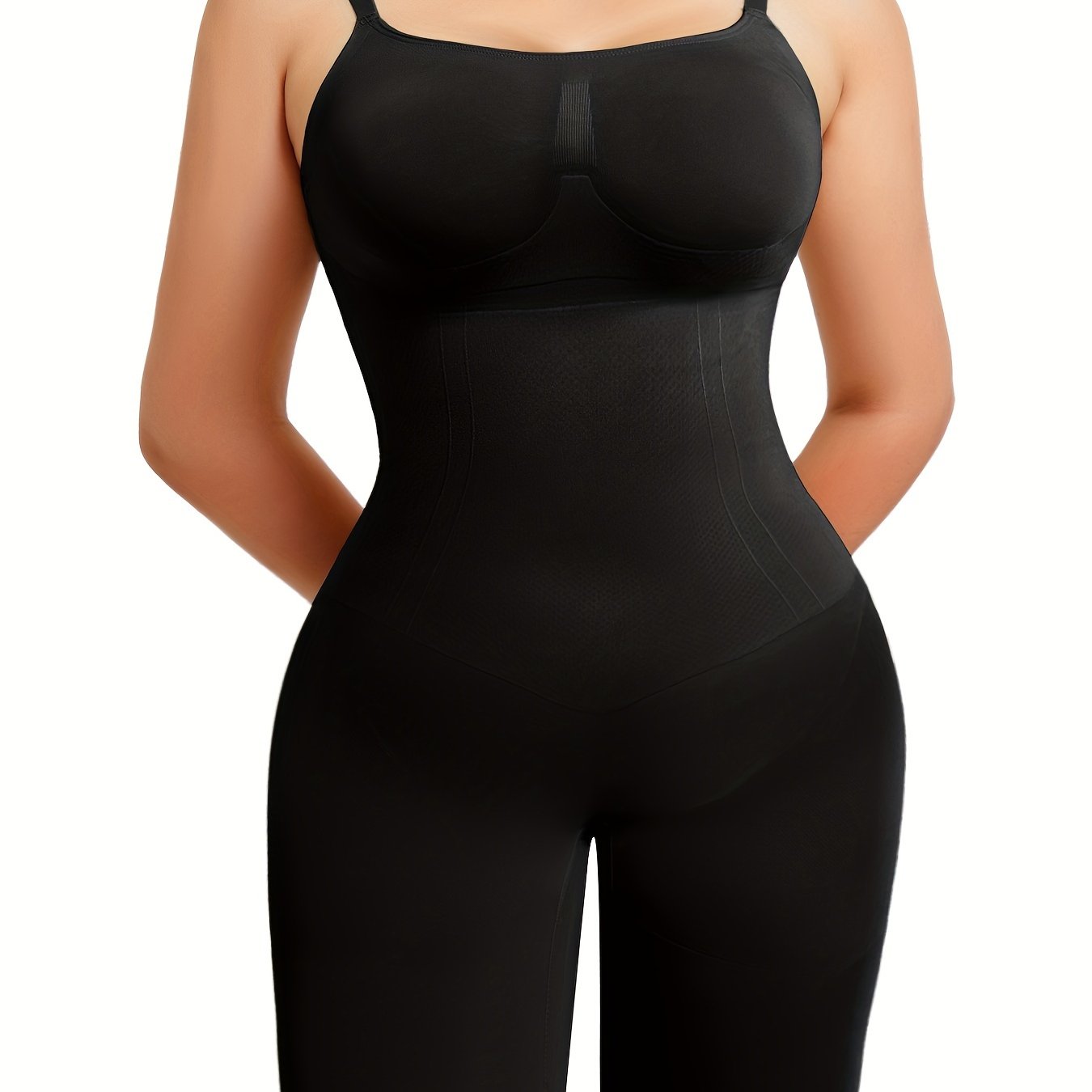 Shaping bodysuit for curvy women with seamless control panels and high-stretch fit.

