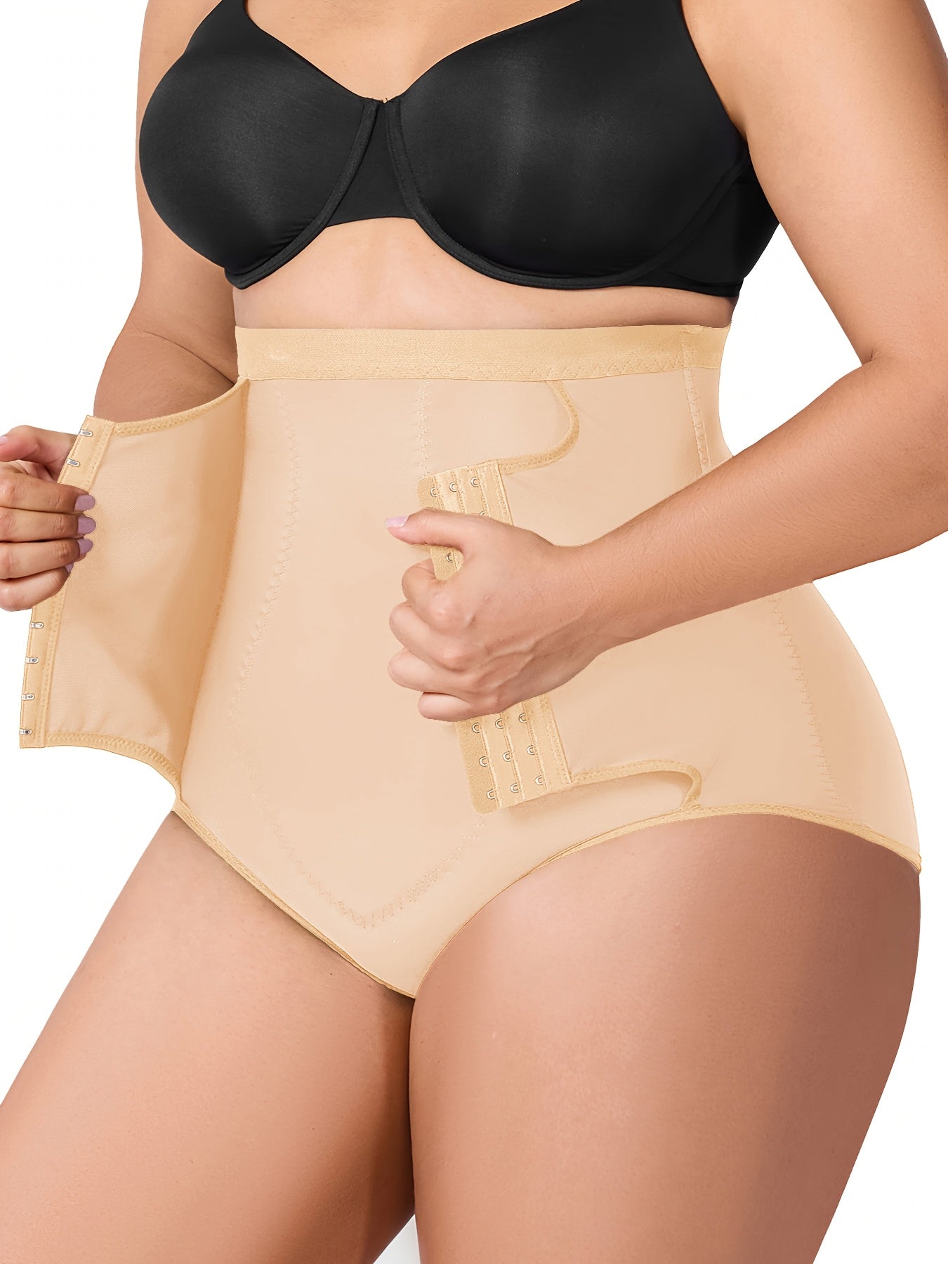 Firm control high-rise shapewear in black, designed for confident wear under tight clothing.