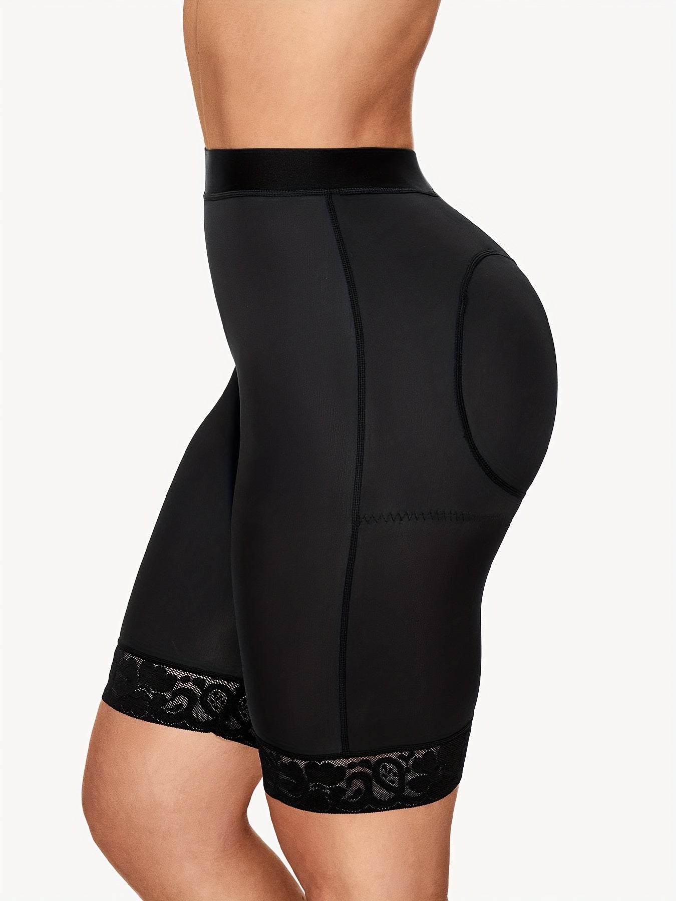 Lace-trimmed sporty shorts offering light compression and a sleek silhouette under clothing.

