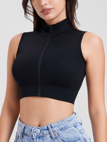 Minimalist white workout crop top featuring sleek zipper and clean sporty lines.

