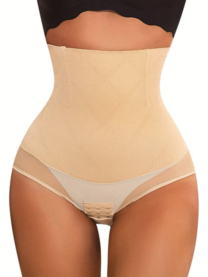 Nude seamless shaping panties with high waistband, tummy control, and sculpting fit.

