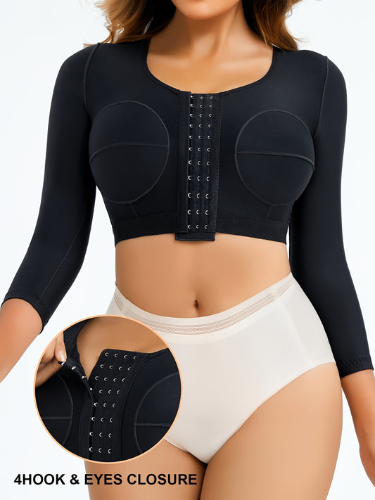 Seamless compression long sleeve top for women with firm sculpting and body-contouring design.

