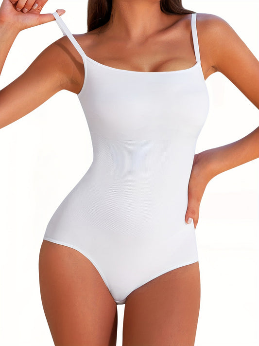 Seamless shaping bodysuit in white with smoothing fabric and gentle compression for a sculpted silhouette.

