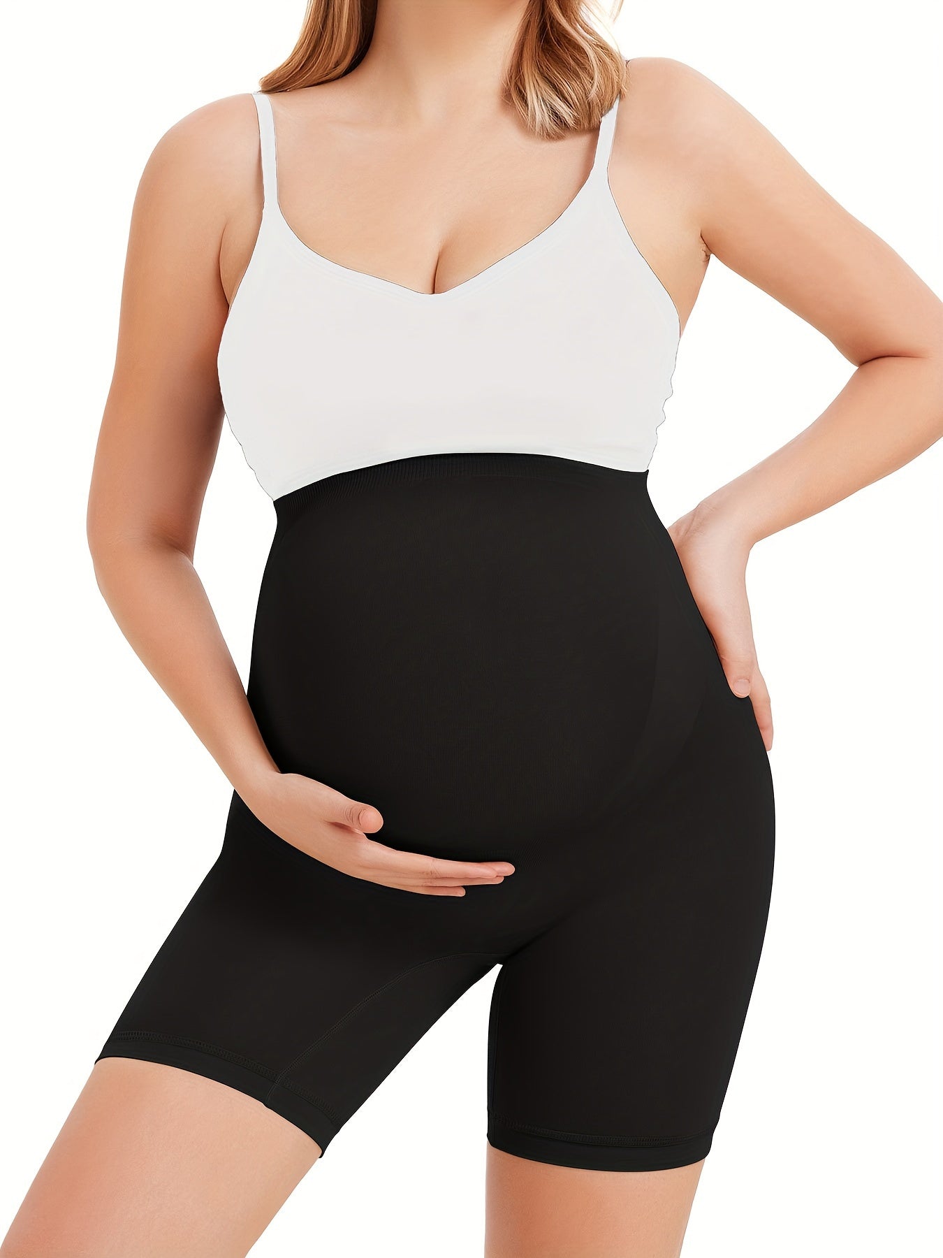 Supportive maternity shorts providing back and pelvic comfort while staying soft and breathable.