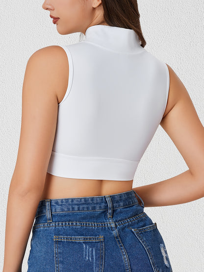 High neck white crop top with zipper front and supportive underband for a snug fit.

